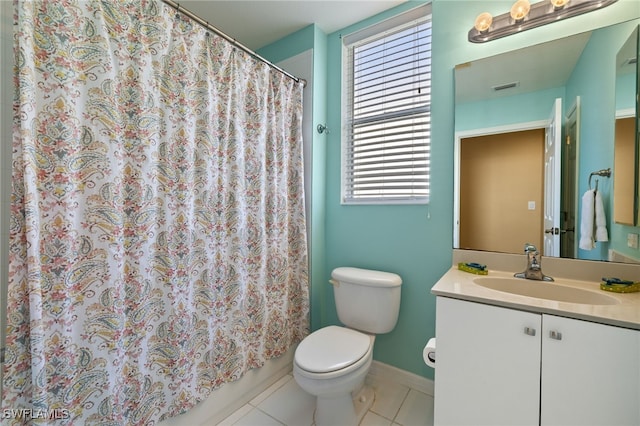 bathroom with vanity, a shower with curtain, baseboards, tile patterned floors, and toilet