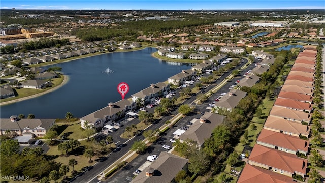 birds eye view of property featuring a residential view and a water view