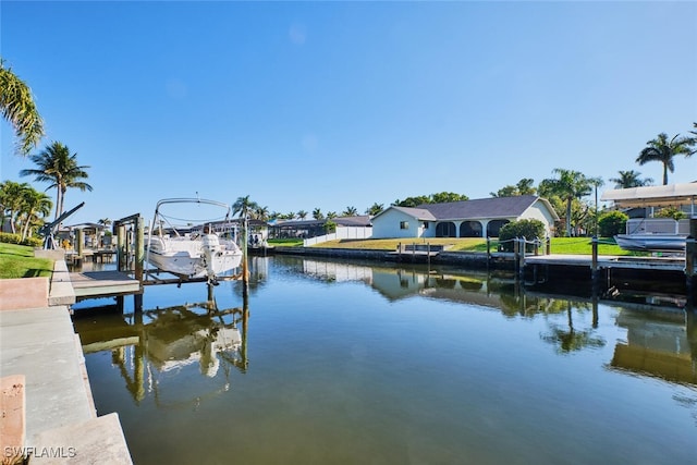 view of dock featuring a water view and boat lift