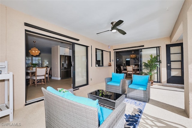 view of patio featuring outdoor lounge area, outdoor dining area, and ceiling fan