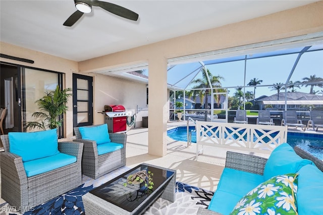 view of patio / terrace featuring a lanai, an outdoor hangout area, an outdoor pool, and grilling area