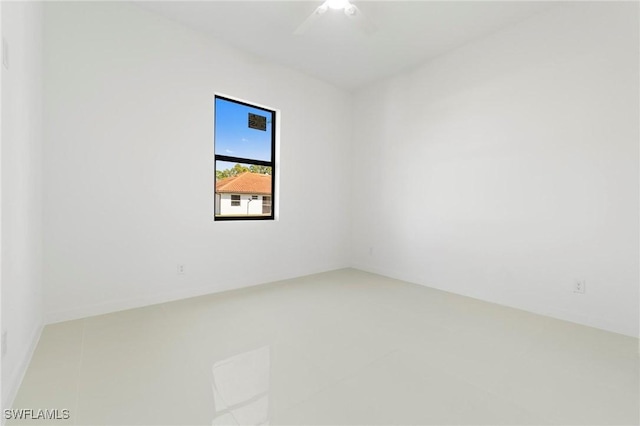 unfurnished room featuring a ceiling fan