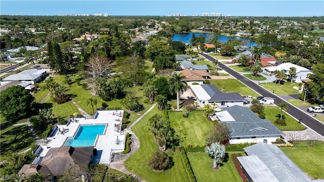 bird's eye view with a residential view and a water view