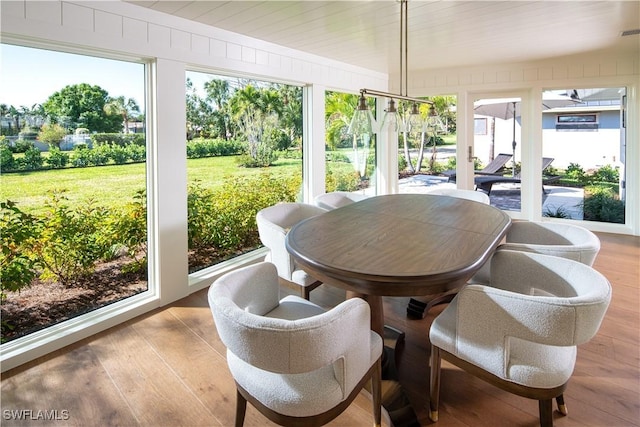 sunroom / solarium featuring visible vents