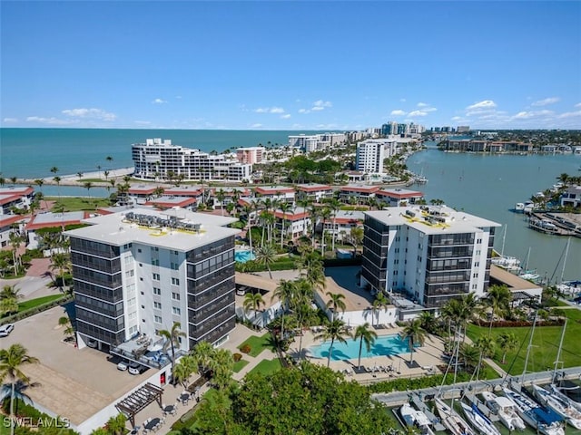 drone / aerial view with a water view and a city view