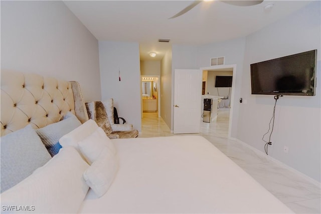 bedroom with marble finish floor, visible vents, ensuite bathroom, and baseboards