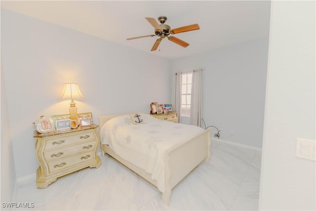 bedroom with baseboards, marble finish floor, and ceiling fan