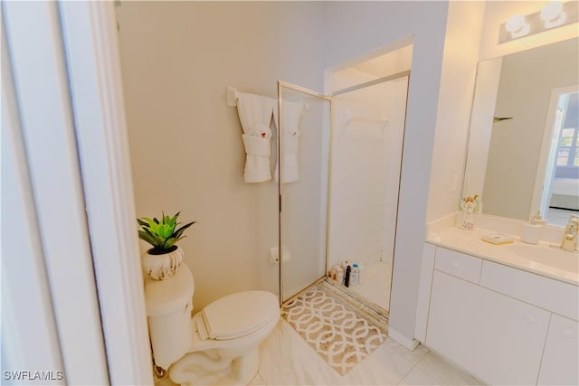 full bathroom with vanity, toilet, a shower stall, and tile patterned flooring