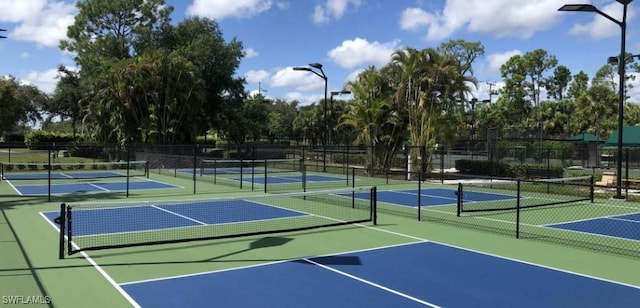 view of sport court featuring community basketball court and fence