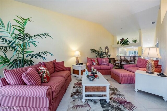 2381 Hidden Lake Ct Unit 8202, Naples, FL 34112 - living room featuring tile patterned floors and lofted ceiling
