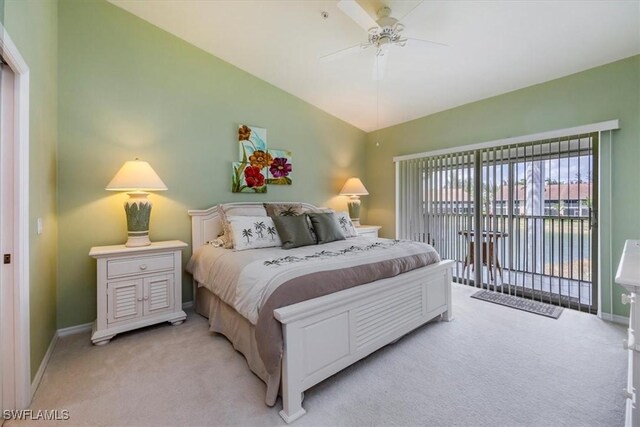 2381 Hidden Lake Ct Unit 8202, Naples, FL 34112 - bedroom with light carpet, access to outside, baseboards, vaulted ceiling, and ceiling fan