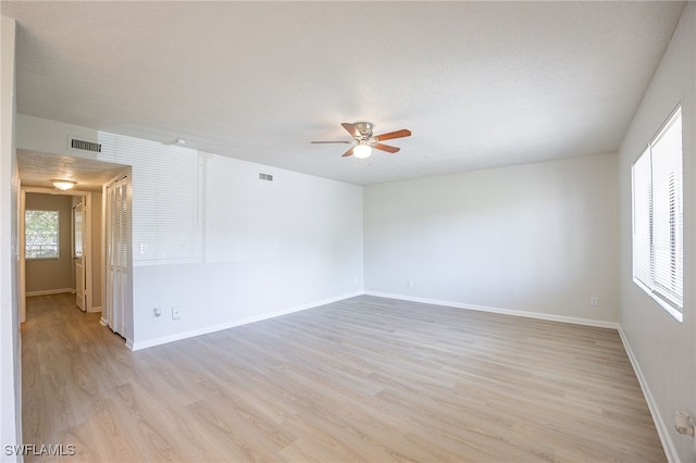 4605 Bayshore Dr Unit G6, Naples, FL 34112 - spare room with ceiling fan and light wood-type flooring