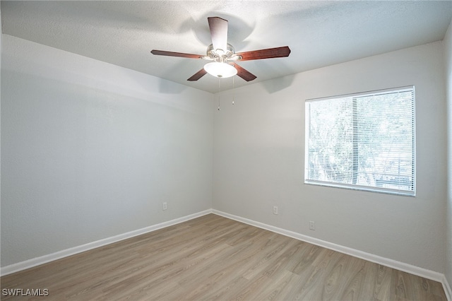 4605 Bayshore Dr Unit G6, Naples, FL 34112 - empty room with light wood-style floors and ceiling fan
