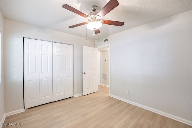 4605 Bayshore Dr Unit G6, Naples, FL 34112 - unfurnished bedroom with light wood-type flooring, a closet, and ceiling fan