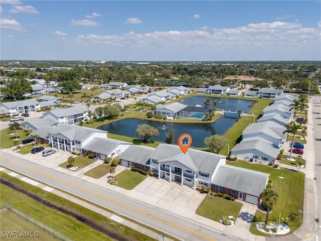 aerial view featuring a residential view and a water view