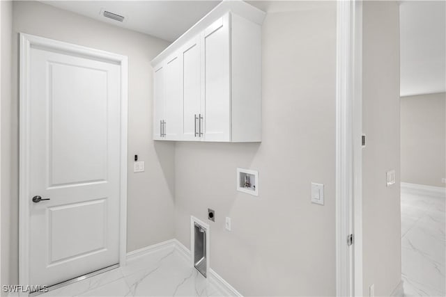 washroom featuring visible vents, marble finish floor, cabinet space, hookup for an electric dryer, and hookup for a washing machine