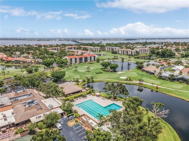 aerial view with a water view and golf course view