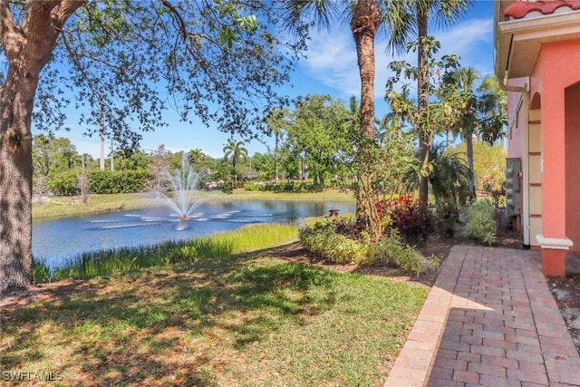 view of yard with a water view