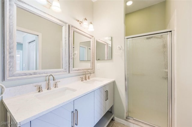 1963 Morning Sun Ln Unit F36, Naples, FL 34119 - full bathroom with a sink, double vanity, and a shower stall