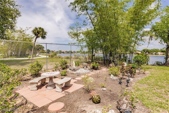 view of yard featuring a patio area and fence