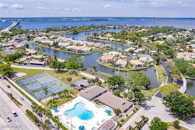 birds eye view of property featuring a residential view and a water view