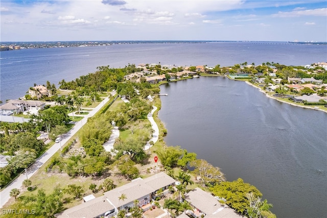 aerial view featuring a residential view and a water view