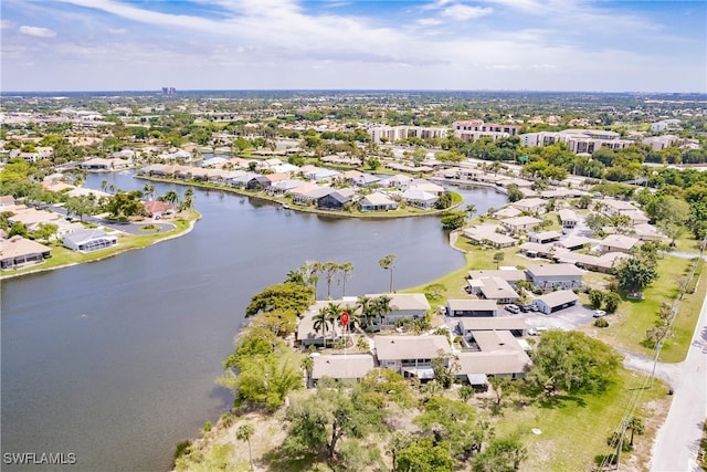 birds eye view of property featuring a residential view and a water view