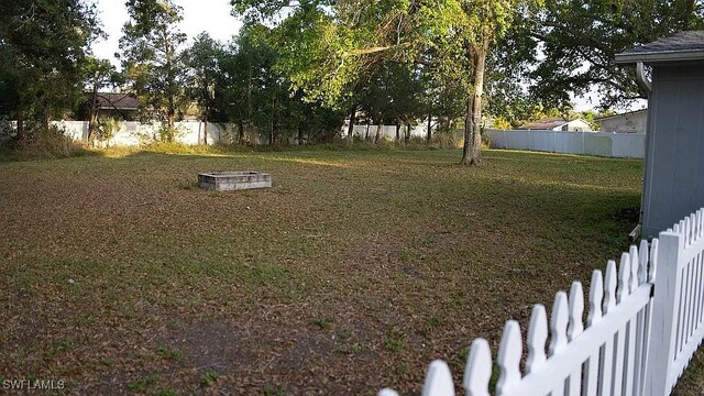 1280 Mcneill Rd, North Fort Myers, FL 33903 - view of yard featuring a fenced backyard