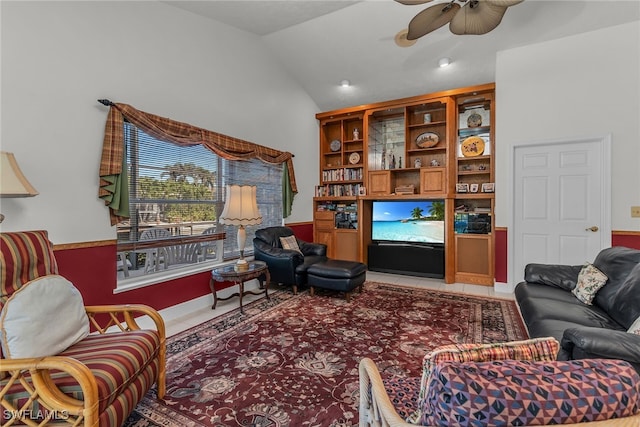 tiled living room with lofted ceiling and a ceiling fan