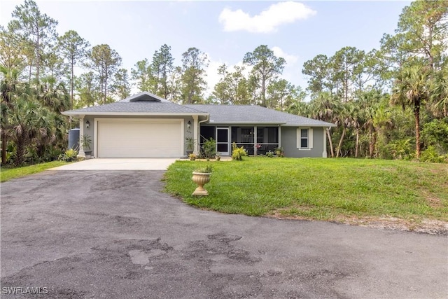 420 20th Ave NW, Naples, FL 34120 - single story home with asphalt driveway, a garage, a front lawn, and stucco siding