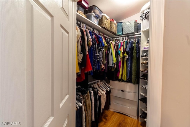 420 20th Ave NW, Naples, FL 34120 - walk in closet with wood finished floors