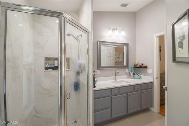 420 20th Ave NW, Naples, FL 34120 - full bathroom featuring vanity and a stall shower