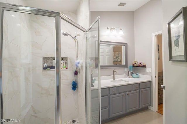 420 20th Ave NW, Naples, FL 34120 - bathroom with a shower stall and vanity