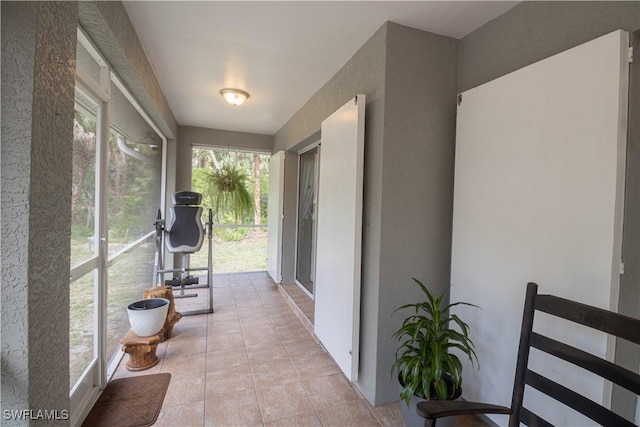420 20th Ave NW, Naples, FL 34120 - sunroom / solarium featuring tile patterned floors
