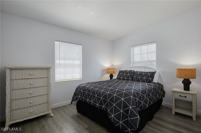 125 Palmetto Cir NE, Port Charlotte, FL 33952 - bedroom with wood finished floors and baseboards