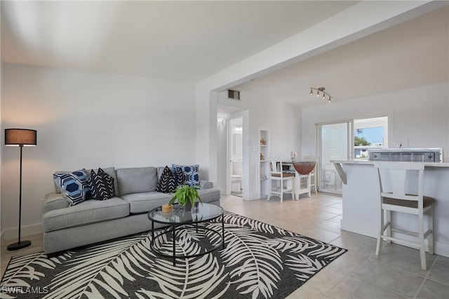 125 Palmetto Cir NE, Port Charlotte, FL 33952 - living area featuring light tile patterned floors