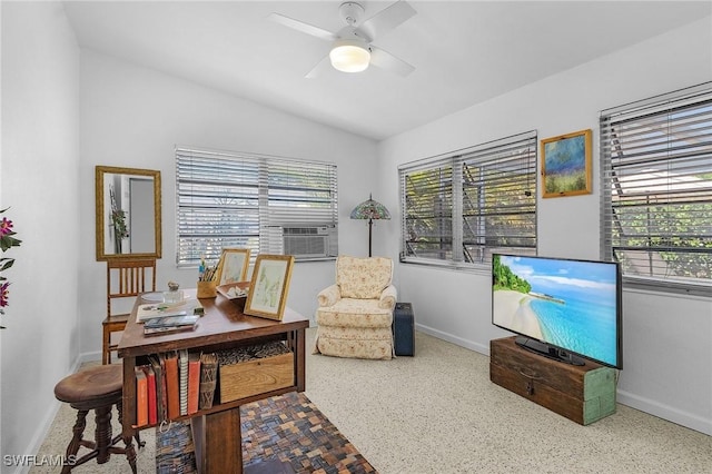 office area with vaulted ceiling, cooling unit, baseboards, and ceiling fan