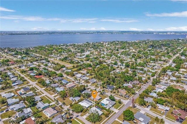 aerial view featuring a residential view and a water view