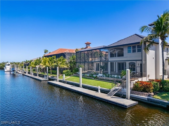 4831 Conover Ct, Fort Myers, FL 33908 - view of dock featuring boat lift, a water view, and a lanai
