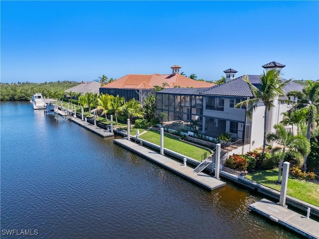 4831 Conover Ct, Fort Myers, FL 33908 - view of dock with boat lift, a water view, and a lanai