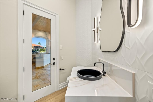 4831 Conover Ct, Fort Myers, FL 33908 - bathroom with toilet, wood finished floors, and vanity