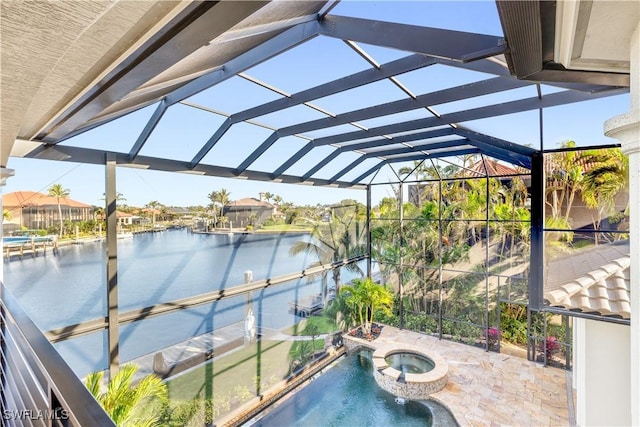 4831 Conover Ct, Fort Myers, FL 33908 - view of patio featuring glass enclosure, a water view, and a pool with connected hot tub