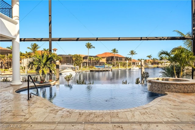 4831 Conover Ct, Fort Myers, FL 33908 - view of swimming pool with a hot tub and a water view