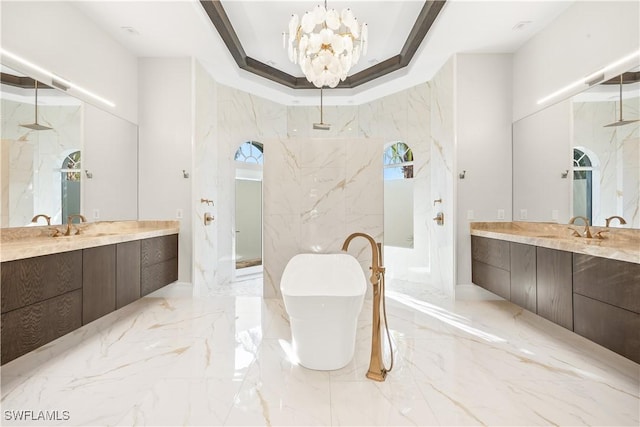 4831 Conover Ct, Fort Myers, FL 33908 - bathroom with a marble finish shower, a raised ceiling, marble finish floor, a freestanding bath, and an inviting chandelier