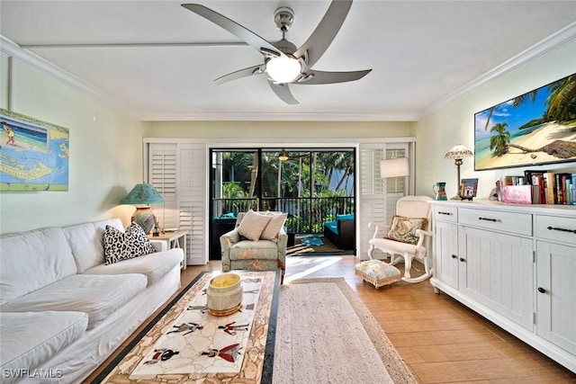 living area featuring light wood finished floors, crown molding, and ceiling fan