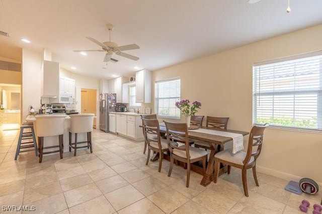 7639 Novara Ct, Naples, FL 34114 - dining space with visible vents, baseboards, ceiling fan, recessed lighting, and light tile patterned floors