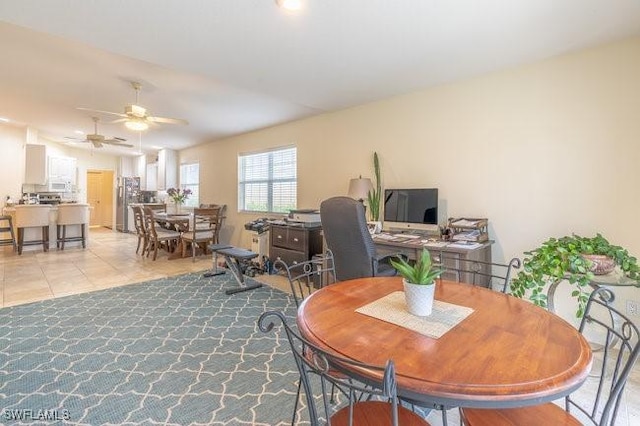 7639 Novara Ct, Naples, FL 34114 - dining space with ceiling fan and light tile patterned floors