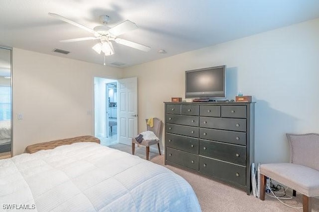 7639 Novara Ct, Naples, FL 34114 - carpeted bedroom with visible vents and ceiling fan