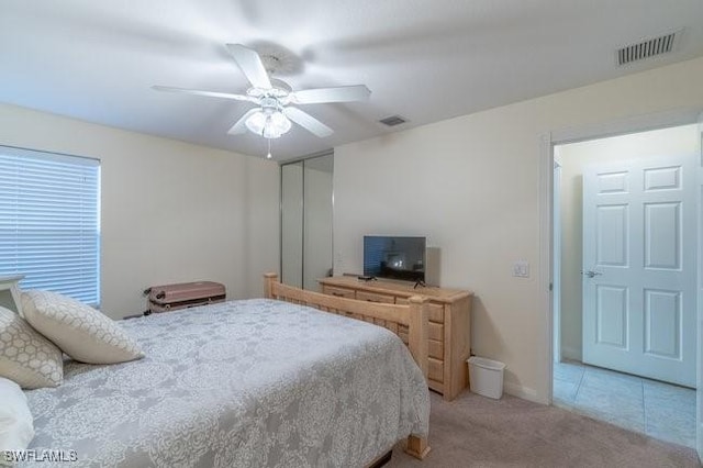 7639 Novara Ct, Naples, FL 34114 - carpeted bedroom featuring ceiling fan and visible vents