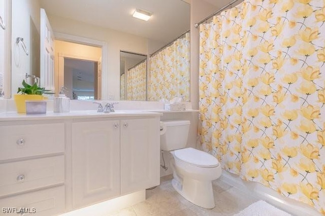 7639 Novara Ct, Naples, FL 34114 - full bathroom with a shower with curtain, toilet, vanity, and tile patterned floors